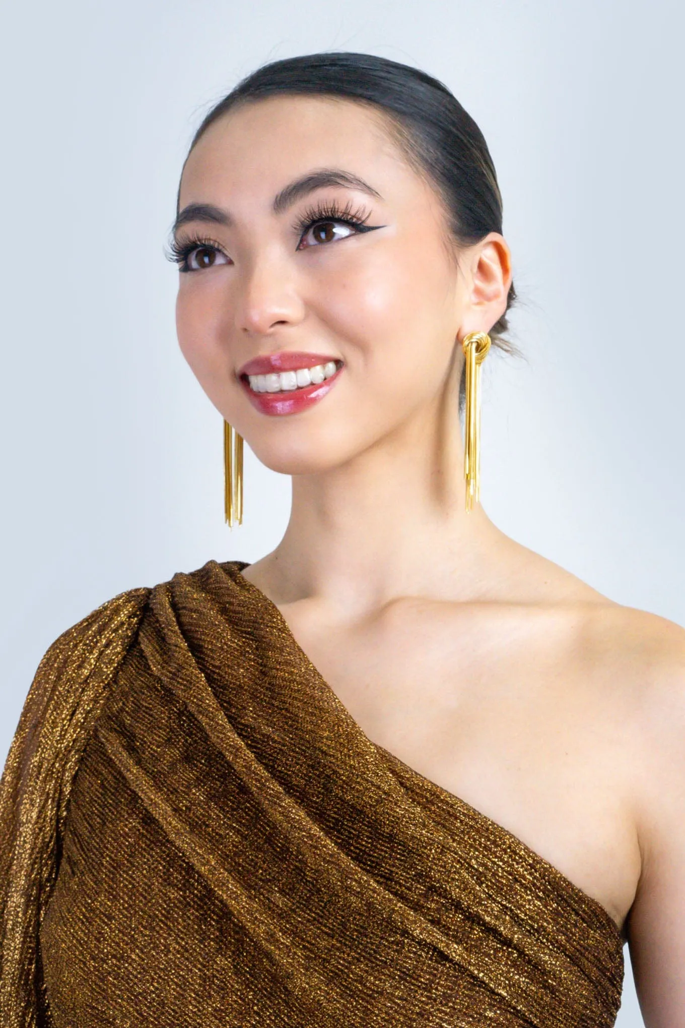 Bronze Lurex Asymmetric Cut Out Gown
