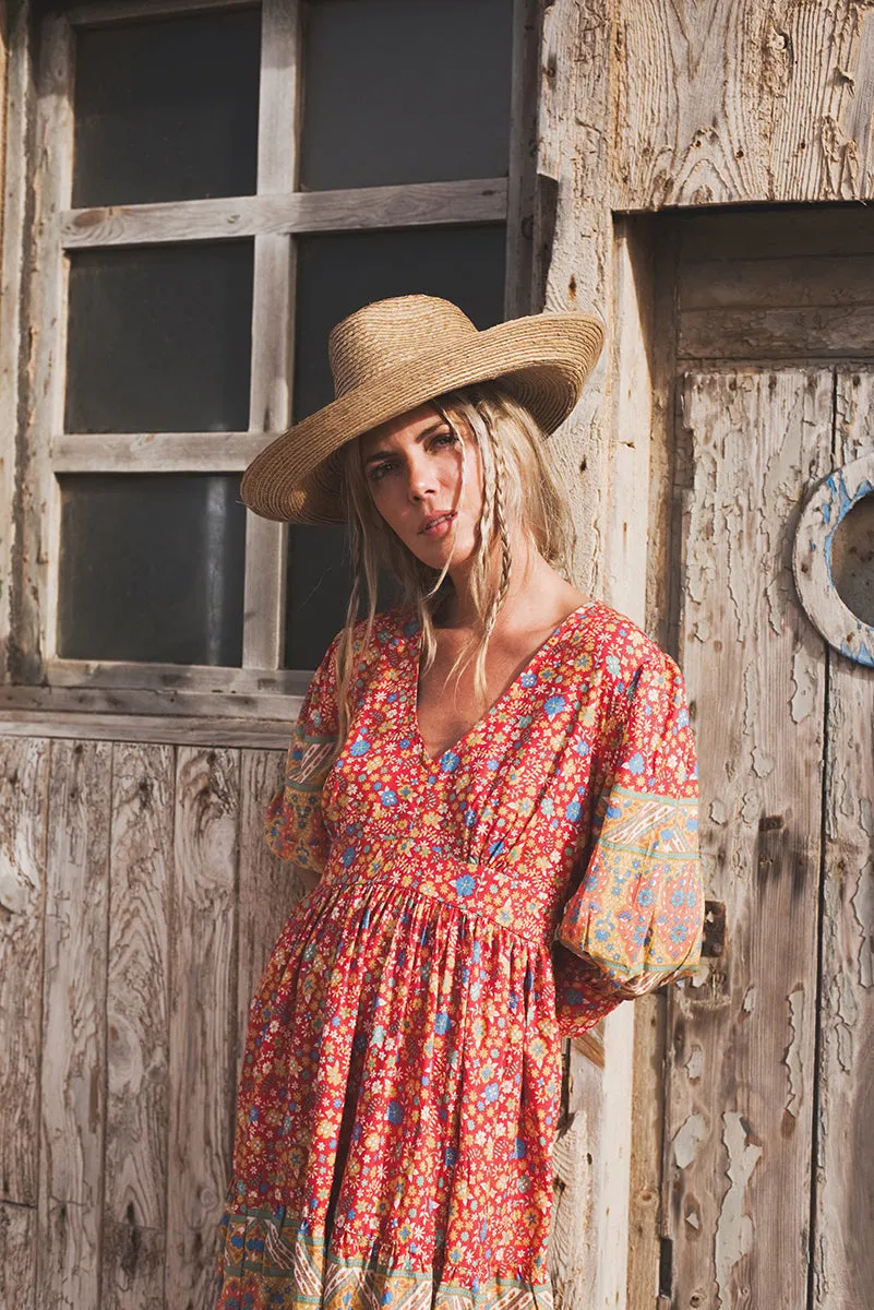 Sure! Here’s an optimized title for the Kelana Dress that includes descriptive modifiers:

**Elegant Kelana Maxi Dress with Flowing Silhouette and Vibrant Floral Print** 

If you have specific features or styles in mind, feel free to share them for further customization!